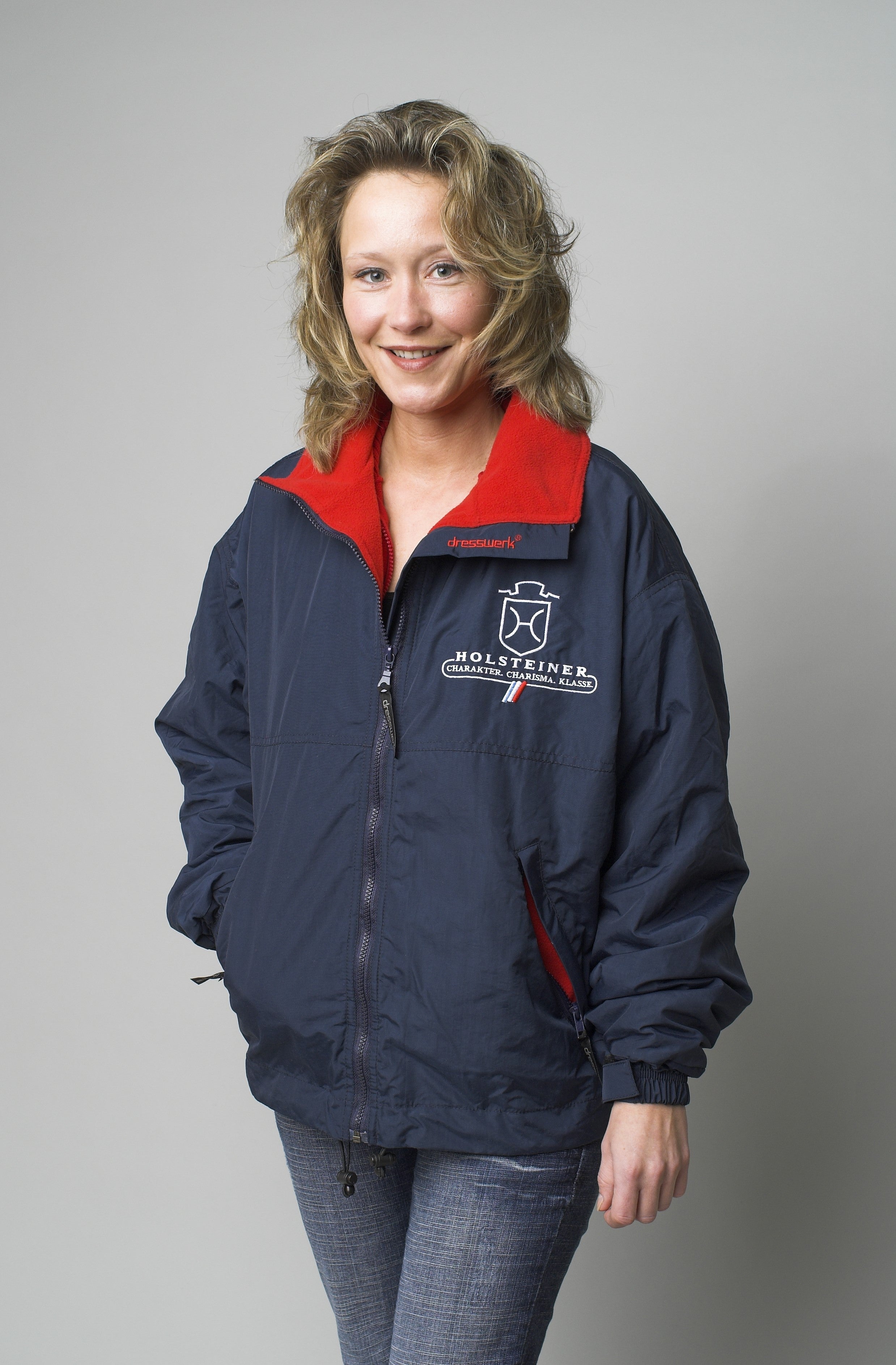 Unisex Holsteiner Windbreaker -  – zuverlässig, funktional und mit echter Verbundenheit zum Pferdesport